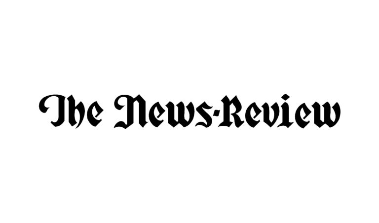 The News Review logo