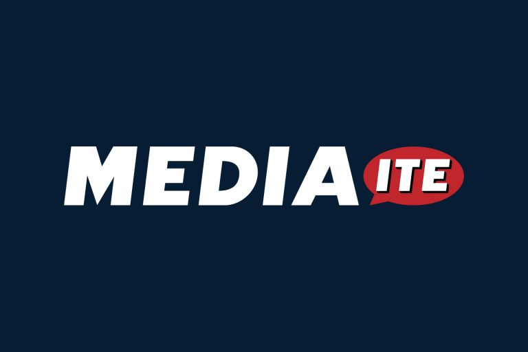 Mediaite - white fill - navy blue background - Featured Image
